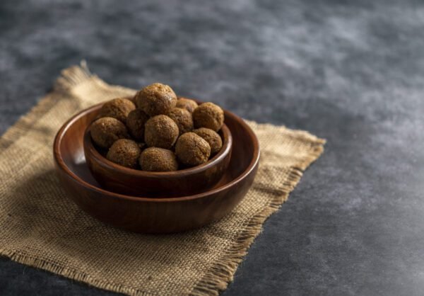 Coconut Jaggery Ladoo  (নাৰিকল গুৰ লাডু) - Image 3