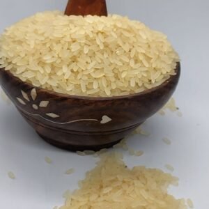 Usna Rice in a spoon in white background : Parboiled rice