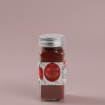 Assamese Ghos pepper Powder with a ghost pepper, Bhut jolokia in a jar